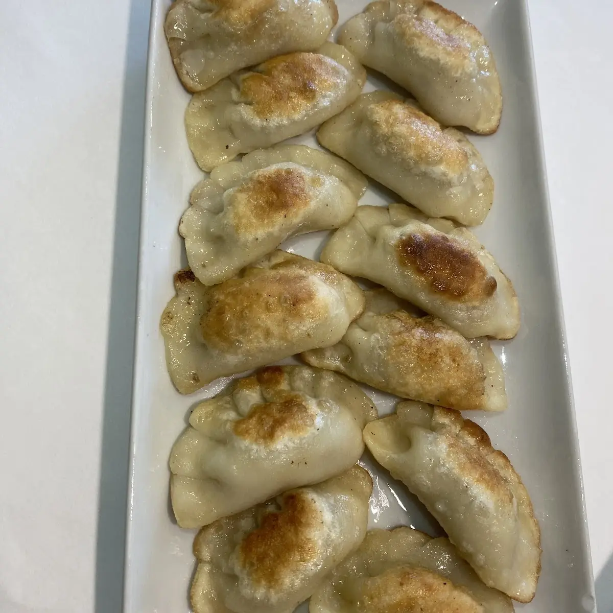 Pan-Fried Lamb Onion Dumplings 10 Pieces 羊肉煎饺